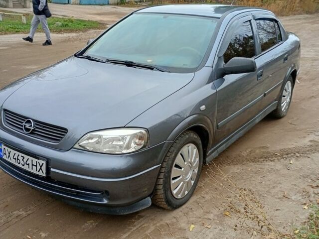 Серый Опель Астра, объемом двигателя 1.4 л и пробегом 210 тыс. км за 3200 $, фото 9 на Automoto.ua