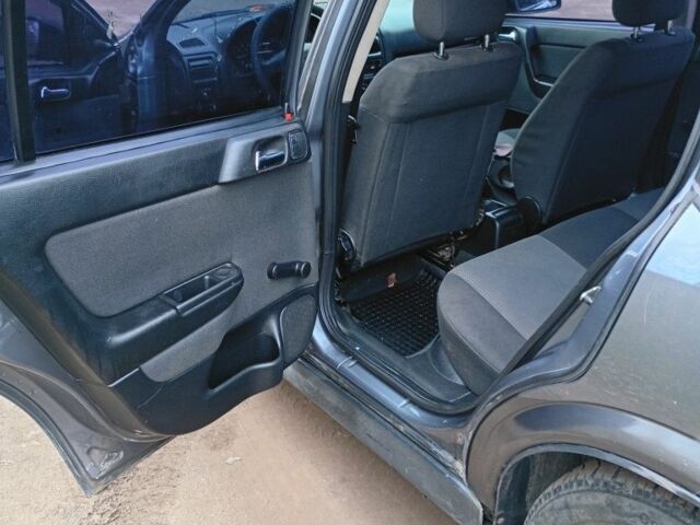 Серый Опель Астра, объемом двигателя 1.4 л и пробегом 210 тыс. км за 3200 $, фото 2 на Automoto.ua