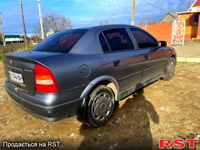 Серый Опель Астра, объемом двигателя 1.4 л и пробегом 212 тыс. км за 3000 $, фото 2 на Automoto.ua