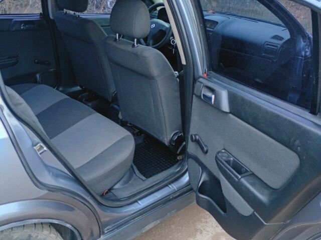 Серый Опель Астра, объемом двигателя 1.4 л и пробегом 210 тыс. км за 3200 $, фото 11 на Automoto.ua