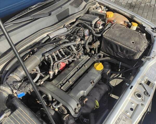 Серый Опель Астра, объемом двигателя 1.39 л и пробегом 242 тыс. км за 3800 $, фото 22 на Automoto.ua