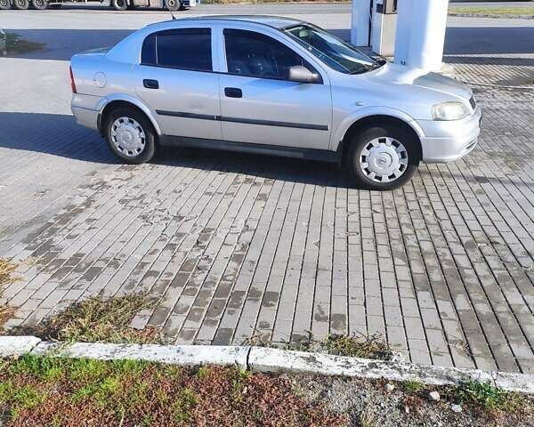 Серый Опель Астра, объемом двигателя 1.39 л и пробегом 242 тыс. км за 3800 $, фото 9 на Automoto.ua