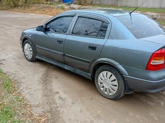 Серый Опель Астра, объемом двигателя 1.4 л и пробегом 210 тыс. км за 3200 $, фото 8 на Automoto.ua