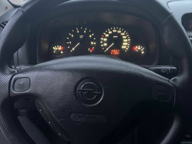 Серый Опель Астра, объемом двигателя 1.4 л и пробегом 300 тыс. км за 5000 $, фото 10 на Automoto.ua