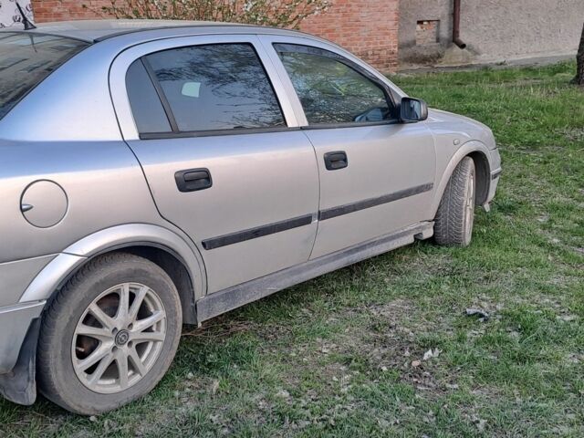 Серый Опель Астра, объемом двигателя 1.4 л и пробегом 250 тыс. км за 3000 $, фото 7 на Automoto.ua