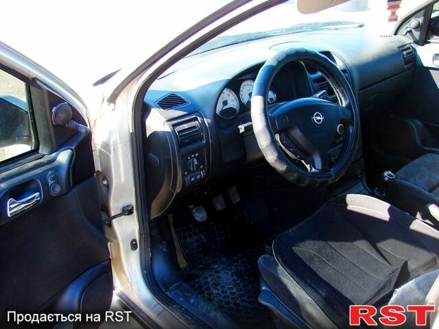 Серый Опель Астра, объемом двигателя 1.4 л и пробегом 260 тыс. км за 2100 $, фото 6 на Automoto.ua