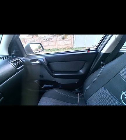 Серый Опель Астра, объемом двигателя 1.4 л и пробегом 215 тыс. км за 3800 $, фото 8 на Automoto.ua