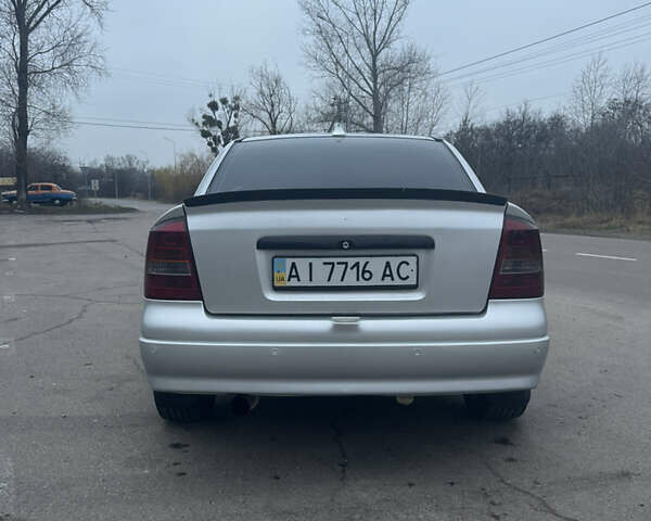 Серый Опель Астра, объемом двигателя 1.4 л и пробегом 300 тыс. км за 5000 $, фото 7 на Automoto.ua