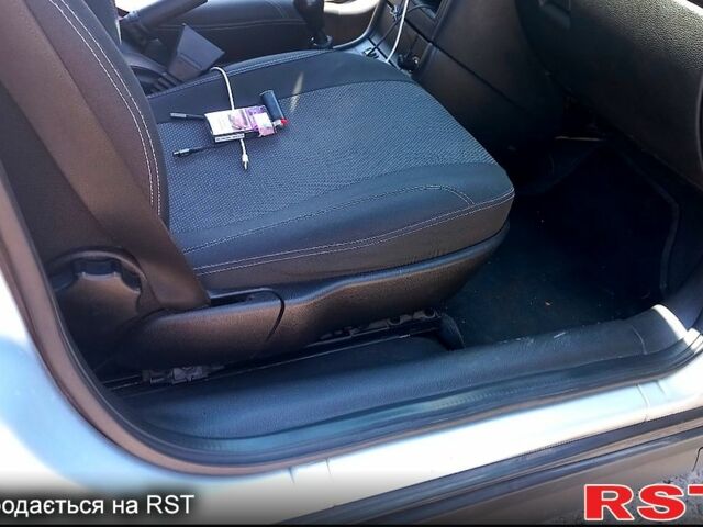 Серый Опель Астра, объемом двигателя 1.4 л и пробегом 215 тыс. км за 3800 $, фото 3 на Automoto.ua