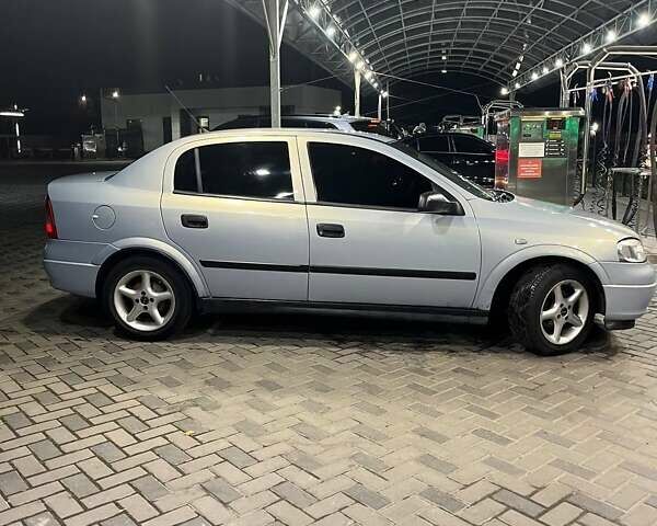 Серый Опель Астра, объемом двигателя 1.4 л и пробегом 146 тыс. км за 3600 $, фото 5 на Automoto.ua