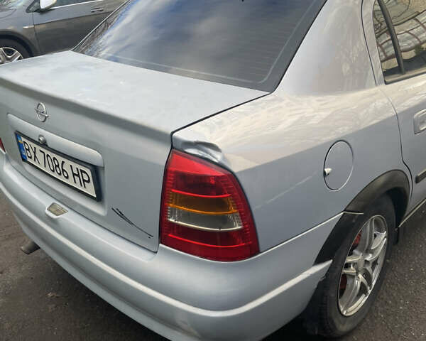 Серый Опель Астра, объемом двигателя 1.6 л и пробегом 290 тыс. км за 2400 $, фото 7 на Automoto.ua