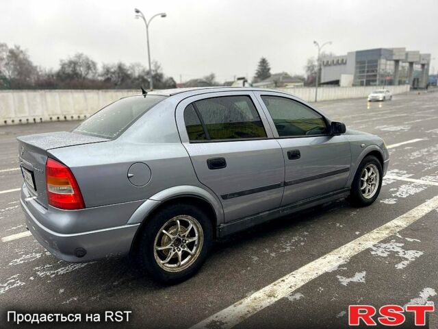 Серый Опель Астра, объемом двигателя 1.4 л и пробегом 25000 тыс. км за 3200 $, фото 10 на Automoto.ua