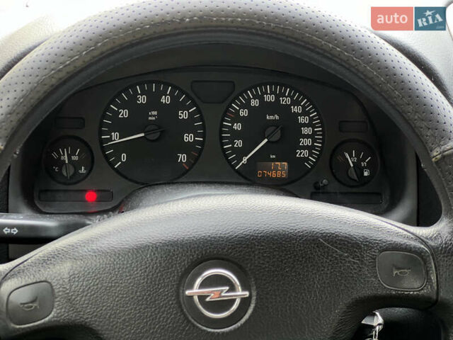 Серый Опель Астра, объемом двигателя 1.36 л и пробегом 77 тыс. км за 3999 $, фото 33 на Automoto.ua