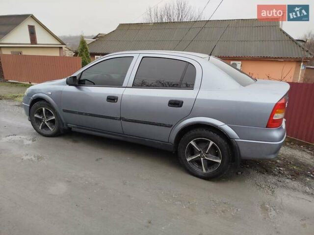 Серый Опель Астра, объемом двигателя 1.4 л и пробегом 197 тыс. км за 3350 $, фото 6 на Automoto.ua