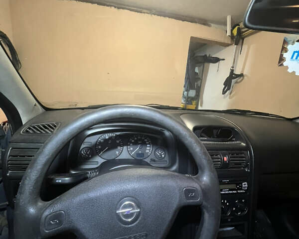 Серый Опель Астра, объемом двигателя 1.4 л и пробегом 351 тыс. км за 3600 $, фото 12 на Automoto.ua