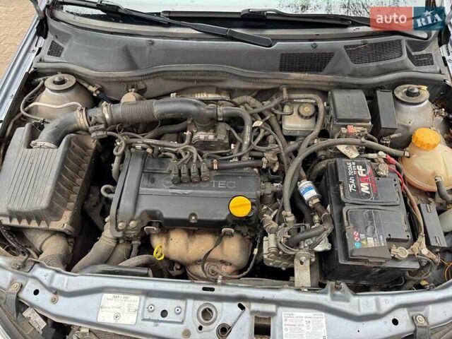 Серый Опель Астра, объемом двигателя 1.4 л и пробегом 185 тыс. км за 4500 $, фото 11 на Automoto.ua