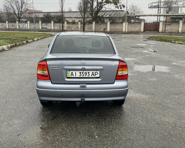 Серый Опель Астра, объемом двигателя 1.4 л и пробегом 283 тыс. км за 3200 $, фото 6 на Automoto.ua