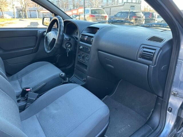 Серый Опель Астра, объемом двигателя 1.4 л и пробегом 116 тыс. км за 4699 $, фото 13 на Automoto.ua