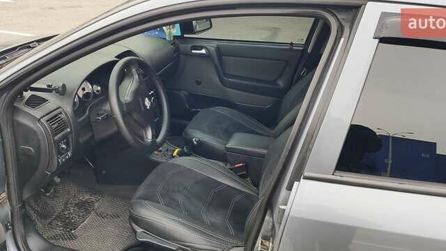 Серый Опель Астра, объемом двигателя 1.4 л и пробегом 156 тыс. км за 4500 $, фото 44 на Automoto.ua