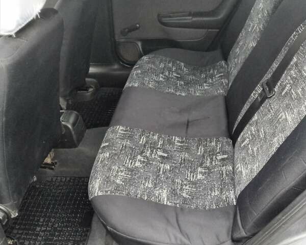 Серый Опель Астра, объемом двигателя 1.4 л и пробегом 201 тыс. км за 3100 $, фото 3 на Automoto.ua