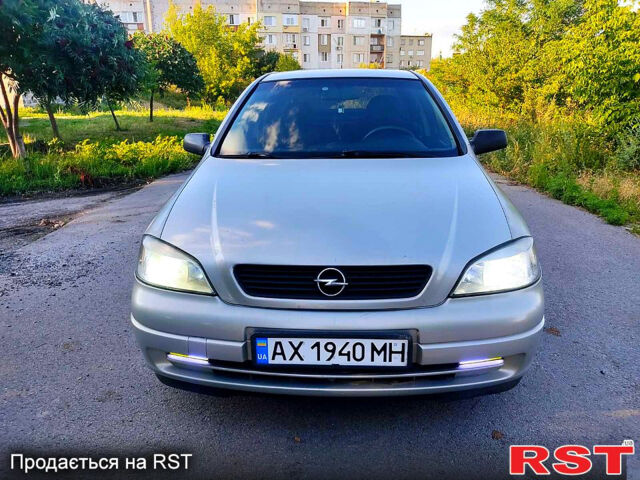 Серый Опель Астра, объемом двигателя 1.4 л и пробегом 198 тыс. км за 3500 $, фото 3 на Automoto.ua