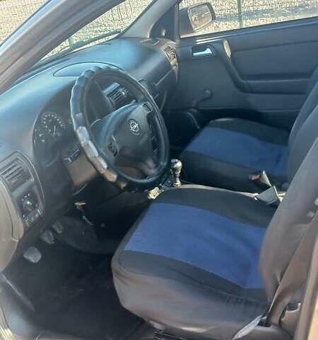 Серый Опель Астра, объемом двигателя 1.4 л и пробегом 400 тыс. км за 2300 $, фото 9 на Automoto.ua