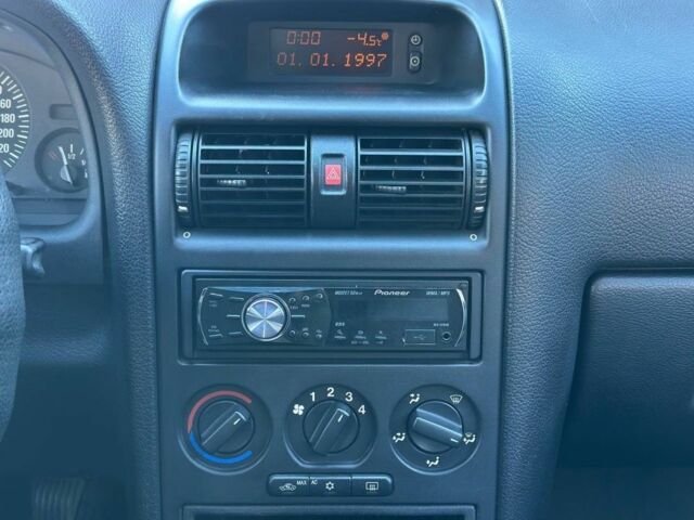 Серый Опель Астра, объемом двигателя 1.4 л и пробегом 116 тыс. км за 4699 $, фото 10 на Automoto.ua