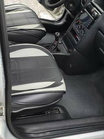 Сірий Опель Астра, об'ємом двигуна 1.4 л та пробігом 205 тис. км за 4840 $, фото 4 на Automoto.ua