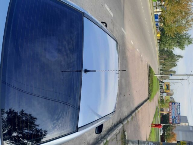 Серый Опель Астра, объемом двигателя 1.4 л и пробегом 282 тыс. км за 3700 $, фото 6 на Automoto.ua