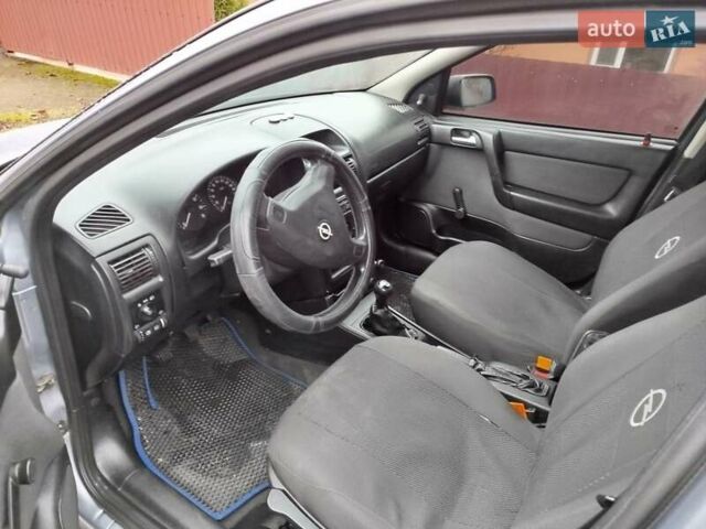 Серый Опель Астра, объемом двигателя 1.4 л и пробегом 197 тыс. км за 3350 $, фото 5 на Automoto.ua