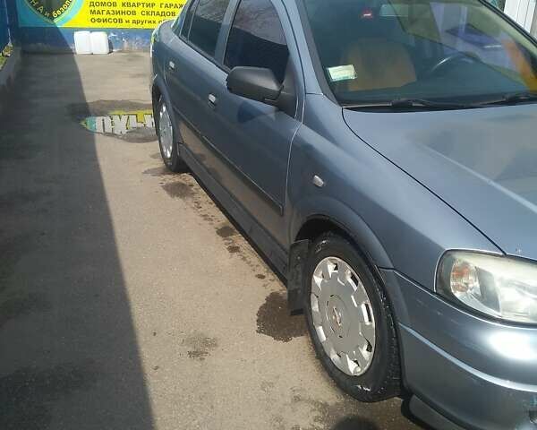 Серый Опель Астра, объемом двигателя 1.4 л и пробегом 278 тыс. км за 4000 $, фото 1 на Automoto.ua