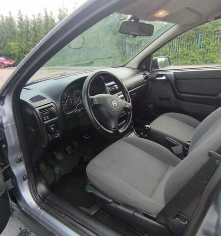 Серый Опель Астра, объемом двигателя 1.39 л и пробегом 145 тыс. км за 3900 $, фото 10 на Automoto.ua