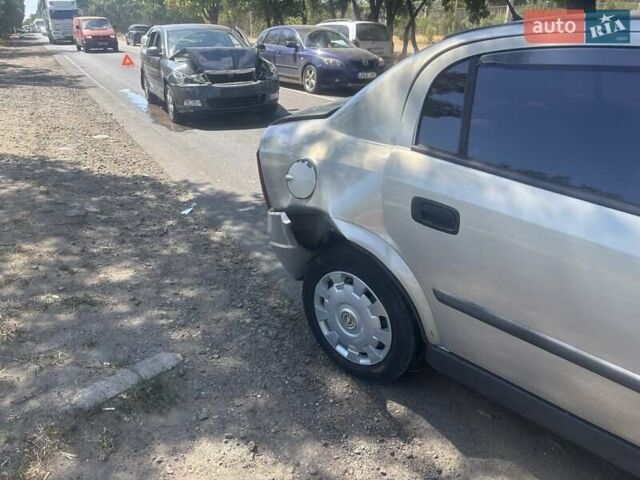 Сірий Опель Астра, об'ємом двигуна 1.4 л та пробігом 195 тис. км за 1500 $, фото 6 на Automoto.ua