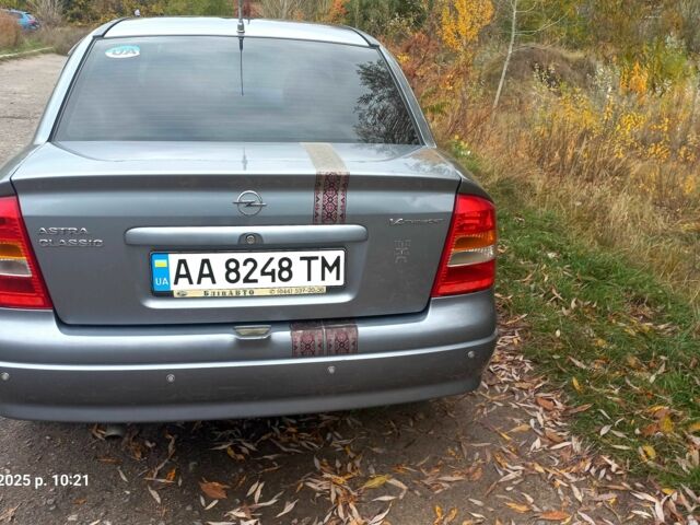 Серый Опель Астра, объемом двигателя 1.4 л и пробегом 212 тыс. км за 4200 $, фото 2 на Automoto.ua