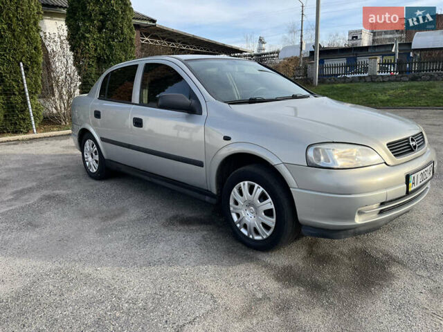 Серый Опель Астра, объемом двигателя 1.39 л и пробегом 230 тыс. км за 3700 $, фото 2 на Automoto.ua