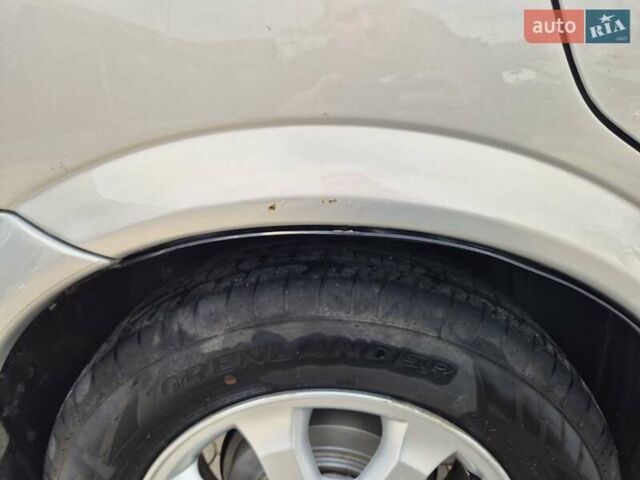 Серый Опель Астра, объемом двигателя 1.4 л и пробегом 361 тыс. км за 3800 $, фото 8 на Automoto.ua