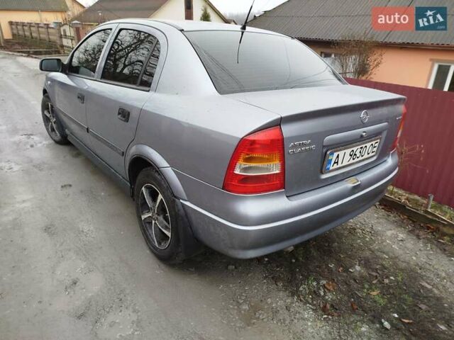 Серый Опель Астра, объемом двигателя 1.4 л и пробегом 197 тыс. км за 3350 $, фото 2 на Automoto.ua