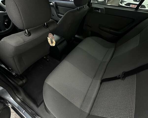 Серый Опель Астра, объемом двигателя 1.36 л и пробегом 186 тыс. км за 4400 $, фото 22 на Automoto.ua