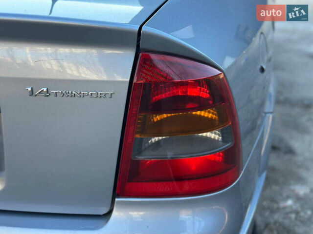 Серый Опель Астра, объемом двигателя 1.4 л и пробегом 116 тыс. км за 4699 $, фото 36 на Automoto.ua