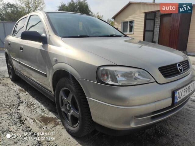 Серый Опель Астра, объемом двигателя 1.4 л и пробегом 216 тыс. км за 3800 $, фото 2 на Automoto.ua