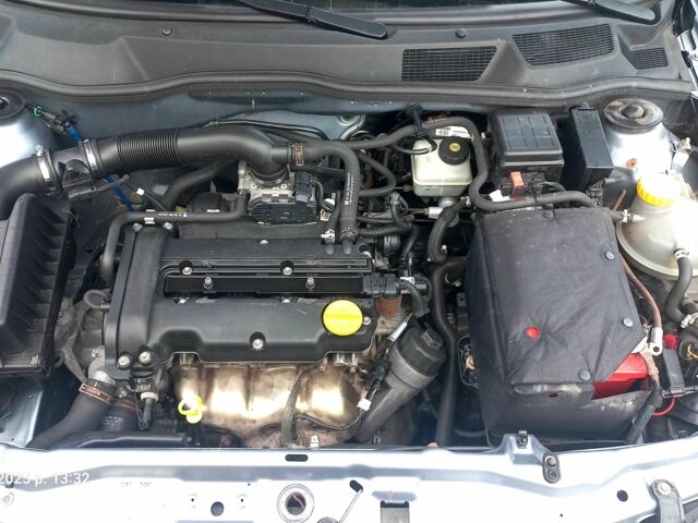 Серый Опель Астра, объемом двигателя 1.4 л и пробегом 212 тыс. км за 4200 $, фото 7 на Automoto.ua