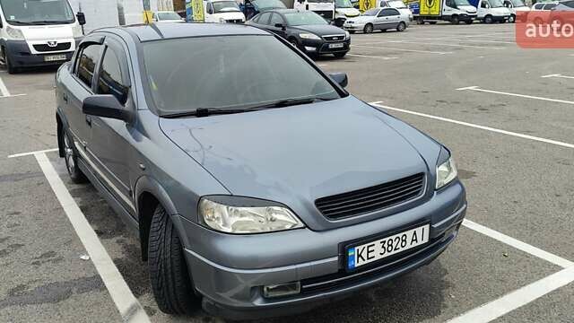 Серый Опель Астра, объемом двигателя 1.4 л и пробегом 156 тыс. км за 4500 $, фото 4 на Automoto.ua