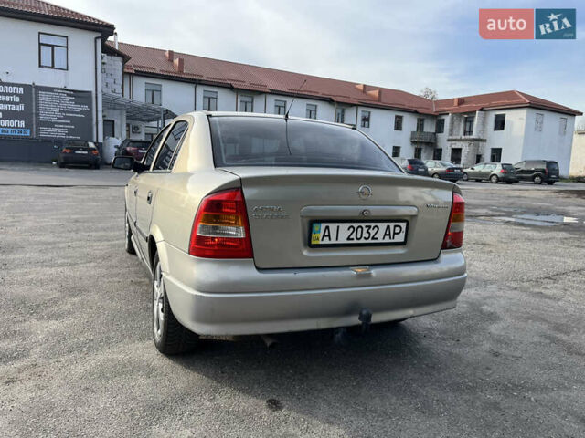 Серый Опель Астра, объемом двигателя 1.39 л и пробегом 230 тыс. км за 3700 $, фото 7 на Automoto.ua