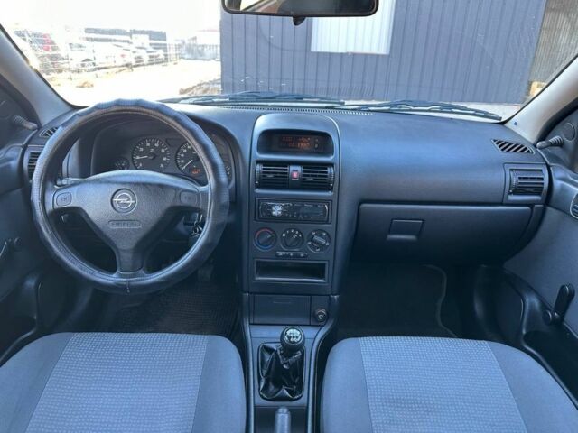 Серый Опель Астра, объемом двигателя 1.4 л и пробегом 116 тыс. км за 4699 $, фото 12 на Automoto.ua