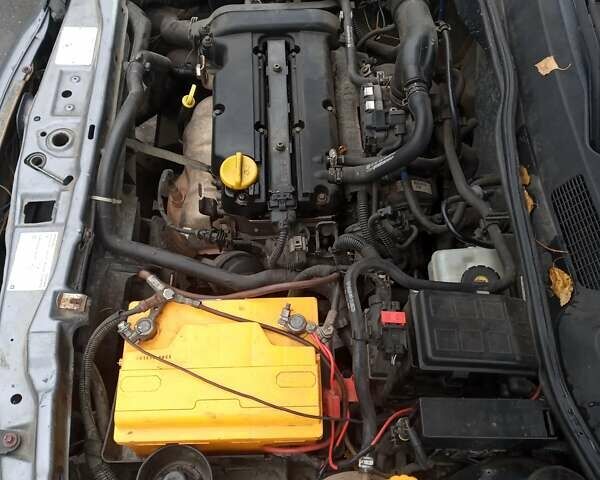 Серый Опель Астра, объемом двигателя 1.4 л и пробегом 201 тыс. км за 3100 $, фото 7 на Automoto.ua