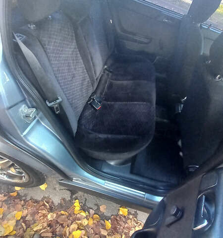 Серый Опель Астра, объемом двигателя 1.4 л и пробегом 212 тыс. км за 3900 $, фото 9 на Automoto.ua