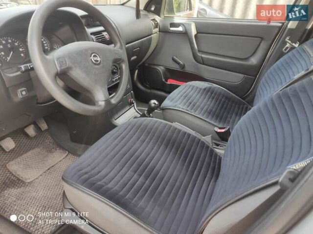 Серый Опель Астра, объемом двигателя 1.4 л и пробегом 216 тыс. км за 3800 $, фото 5 на Automoto.ua