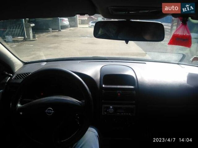 Серый Опель Астра, объемом двигателя 1.4 л и пробегом 278 тыс. км за 4000 $, фото 2 на Automoto.ua