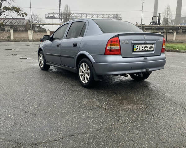 Серый Опель Астра, объемом двигателя 1.4 л и пробегом 283 тыс. км за 3200 $, фото 10 на Automoto.ua