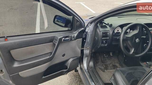 Серый Опель Астра, объемом двигателя 1.4 л и пробегом 156 тыс. км за 4500 $, фото 42 на Automoto.ua